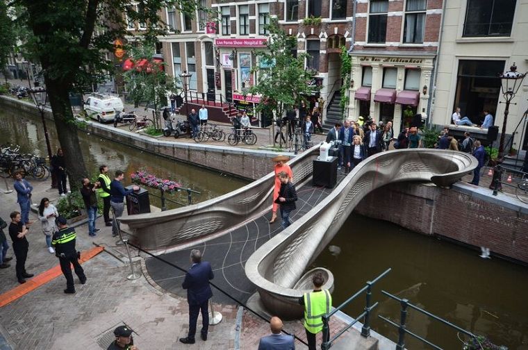 ภาพจาก

https-//www.designboom.com/design/world-first-3d-printed-steel-bridge-amsterdam-canals-mx3d-07-16-2021/?fbclid=IwAR1I7GlmL2xGO0LZ7yh1KGPliXMC62mTu9wJd4yS1Fd9Y5o6OkBl-Q4X5aw
