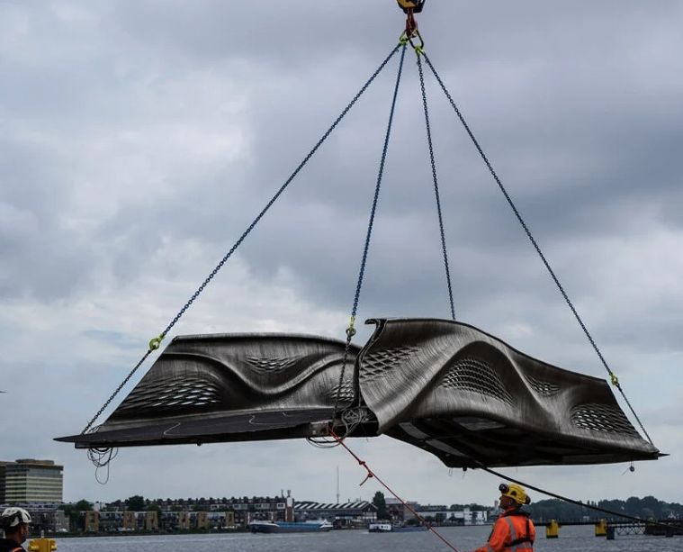 ภาพจาก

https-//www.designboom.com/design/world-first-3d-printed-steel-bridge-amsterdam-canals-mx3d-07-16-2021/?fbclid=IwAR1I7GlmL2xGO0LZ7yh1KGPliXMC62mTu9wJd4yS1Fd9Y5o6OkBl-Q4X5aw
