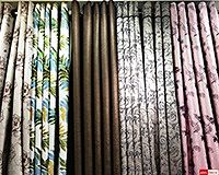 At Fabric Plus (Phahurat Textile Market), we offer a wide selection of curtain fabrics and materials and provide custom make curtains that frame the windows and doors of your perfectly. Please visit our curtain fabric shop located on Phahurat road, across from China World and near India Emporium and The Old Siam to view the selection of curtain fabrics and materials we have on offer. We sell our curtain fabrics at factory prices as we supply them straight from the factory.Fabric Plus Co Ltd wholesales and retails curtain fabrics in the well-renowned Little India textile market at factory prices.We specialize in a variety of curtain fabrics and offer bespoke ‘made to measure’ curtains. We wholesale and retail curtain fabrics of top quality that increase the charm and elegance to your home. Our curtain tailors are especially skilled with making curtains with many years of professional experience and can custom make several styles of curtains and designs to drape your windows in the way that bring the beauty out from the curtains.We offer several types of curtain fabrics including satin jacquard, cotton, blackout curtains, and blackout linings. We also have many different types of sheers on offer from the plain off-white colored sheers to the fancy types with many features such as intricate laces and colorful designs. Our UV blackout curtains have a special UV-protection lining in between the fabrics making them invisible and also makes the curtain look beautiful from both sides.We offer a variety of curtain textures: some with low dust retention, plain color on one side, glossy with miniature designs on the other. We focus on the details that make our curtains stand out so that they add elegance and prestige to the appearance of your home. Our installation service is clean, fast and our staff are courteous. We always want you to have the best curtains.Our shop contains entire rolls of curtain fabrics that you can choose from, the curtain shop is on Phahurat Road right across China World. The location is near the famous “The Old Siam” department store and “India Emporium”.Please visit us to view the wonderful selections we have on offer. We focus on customer satisfaction with our products and services. We always choose high quality curtain equipment and materials for our curtains to make sure that our customers are happy with our products and services.