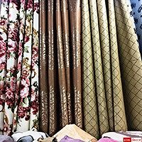 At Fabric Plus (Phahurat Textile Market), we offer a wide selection of curtain fabrics and materials and provide custom make curtains that frame the windows and doors of your perfectly. Please visit our curtain fabric shop located on Phahurat road, across from China World and near India Emporium and The Old Siam to view the selection of curtain fabrics and materials we have on offer. We sell our curtain fabrics at factory prices as we supply them straight from the factory.Fabric Plus Co Ltd wholesales and retails curtain fabrics in the well-renowned Little India textile market at factory prices.We specialize in a variety of curtain fabrics and offer bespoke ‘made to measure’ curtains. We wholesale and retail curtain fabrics of top quality that increase the charm and elegance to your home. Our curtain tailors are especially skilled with making curtains with many years of professional experience and can custom make several styles of curtains and designs to drape your windows in the way that bring the beauty out from the curtains.We offer several types of curtain fabrics including satin jacquard, cotton, blackout curtains, and blackout linings. We also have many different types of sheers on offer from the plain off-white colored sheers to the fancy types with many features such as intricate laces and colorful designs. Our UV blackout curtains have a special UV-protection lining in between the fabrics making them invisible and also makes the curtain look beautiful from both sides.We offer a variety of curtain textures: some with low dust retention, plain color on one side, glossy with miniature designs on the other. We focus on the details that make our curtains stand out so that they add elegance and prestige to the appearance of your home. Our installation service is clean, fast and our staff are courteous. We always want you to have the best curtains.Our shop contains entire rolls of curtain fabrics that you can choose from, the curtain shop is on Phahurat Road right across China World. The location is near the famous “The Old Siam” department store and “India Emporium”.Please visit us to view the wonderful selections we have on offer. We focus on customer satisfaction with our products and services. We always choose high quality curtain equipment and materials for our curtains to make sure that our customers are happy with our products and services.