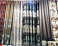 At Fabric Plus (Phahurat Textile Market), we offer a wide selection of curtain fabrics and materials and provide custom make curtains that frame the windows and doors of your perfectly. Please visit our curtain fabric shop located on Phahurat road, across from China World and near India Emporium and The Old Siam to view the selection of curtain fabrics and materials we have on offer. We sell our curtain fabrics at factory prices as we supply them straight from the factory.Fabric Plus Co Ltd wholesales and retails curtain fabrics in the well-renowned Little India textile market at factory prices.We specialize in a variety of curtain fabrics and offer bespoke ‘made to measure’ curtains. We wholesale and retail curtain fabrics of top quality that increase the charm and elegance to your home. Our curtain tailors are especially skilled with making curtains with many years of professional experience and can custom make several styles of curtains and designs to drape your windows in the way that bring the beauty out from the curtains.We offer several types of curtain fabrics including satin jacquard, cotton, blackout curtains, and blackout linings. We also have many different types of sheers on offer from the plain off-white colored sheers to the fancy types with many features such as intricate laces and colorful designs. Our UV blackout curtains have a special UV-protection lining in between the fabrics making them invisible and also makes the curtain look beautiful from both sides.We offer a variety of curtain textures: some with low dust retention, plain color on one side, glossy with miniature designs on the other. We focus on the details that make our curtains stand out so that they add elegance and prestige to the appearance of your home. Our installation service is clean, fast and our staff are courteous. We always want you to have the best curtains.Our shop contains entire rolls of curtain fabrics that you can choose from, the curtain shop is on Phahurat Road right across China World. The location is near the famous “The Old Siam” department store and “India Emporium”.Please visit us to view the wonderful selections we have on offer. We focus on customer satisfaction with our products and services. We always choose high quality curtain equipment and materials for our curtains to make sure that our customers are happy with our products and services.