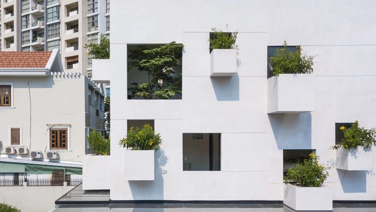 MIA Design Studio covers Vietnamese home with protruding planters